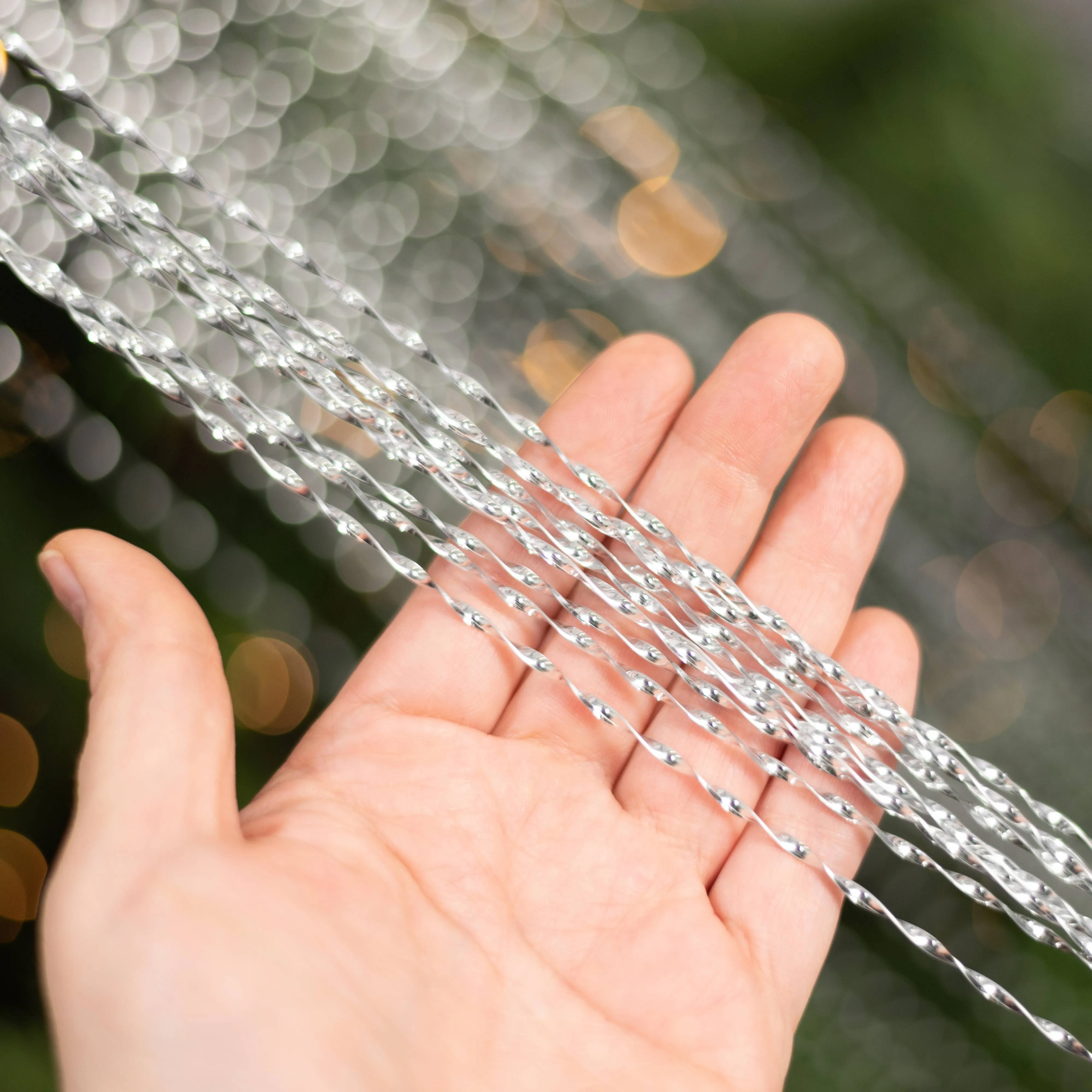 48" Metallic Twisted Grass Spray: Silver
